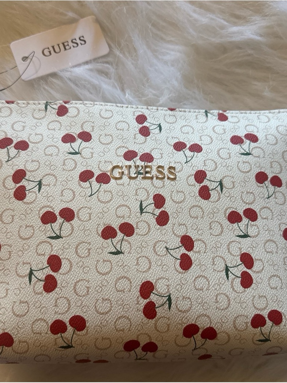 GUESS Gold Logo Wristlet Clasp with Cream Fabric and Red Accent